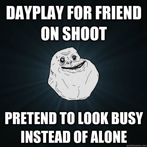 Dayplay for friend on shoot, pretend to look busy instead of alone